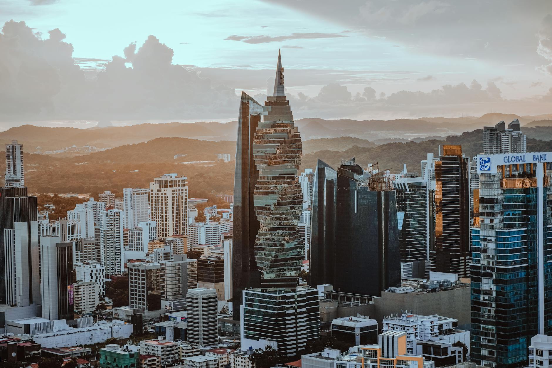 A stunning panoramic view of Panama City's skyline at sunset featuring contemporary skyscrapers.